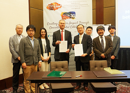 In the center, GÉANT’s Mr. David West (left) and NICT VP Dr. Makoto Imase (right) after the MOU Signing Ceremony