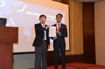 Dr. Vangani Tarun Kumar, I2R receiving a certificate for the project ASEAN Language Speech Translation thru’ U-STAR Dr. Vangani Tarun Kumar, I2R receiving a certificate for the project ASEAN Language Speech Translation thru’ U-STAR
