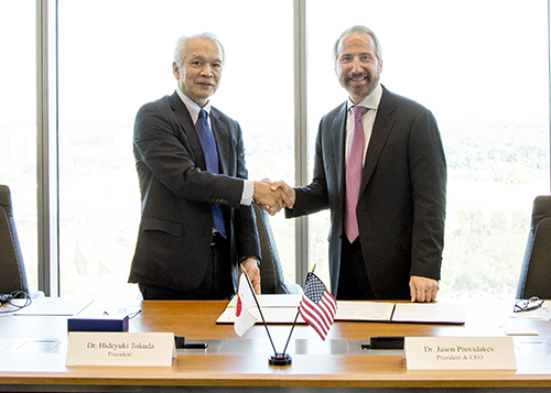Dr. Hedeyuki Tokuda, President of NICT (left) and Dr. Jason Providakes, President and CEO of MITRE (right) signed the MOU at MITRE’s principal office in McLean, VA. Dr. Hedeyuki Tokuda, President of NICT (left) and Dr. Jason Providakes, President and CEO of MITRE (right) signed the MOU at MITRE’s principal office in McLean, VA.