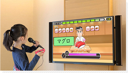 「読みトレGO」でトレーニングする様子。イラストと表示された言葉を時間内に正しく読み上げる訓練